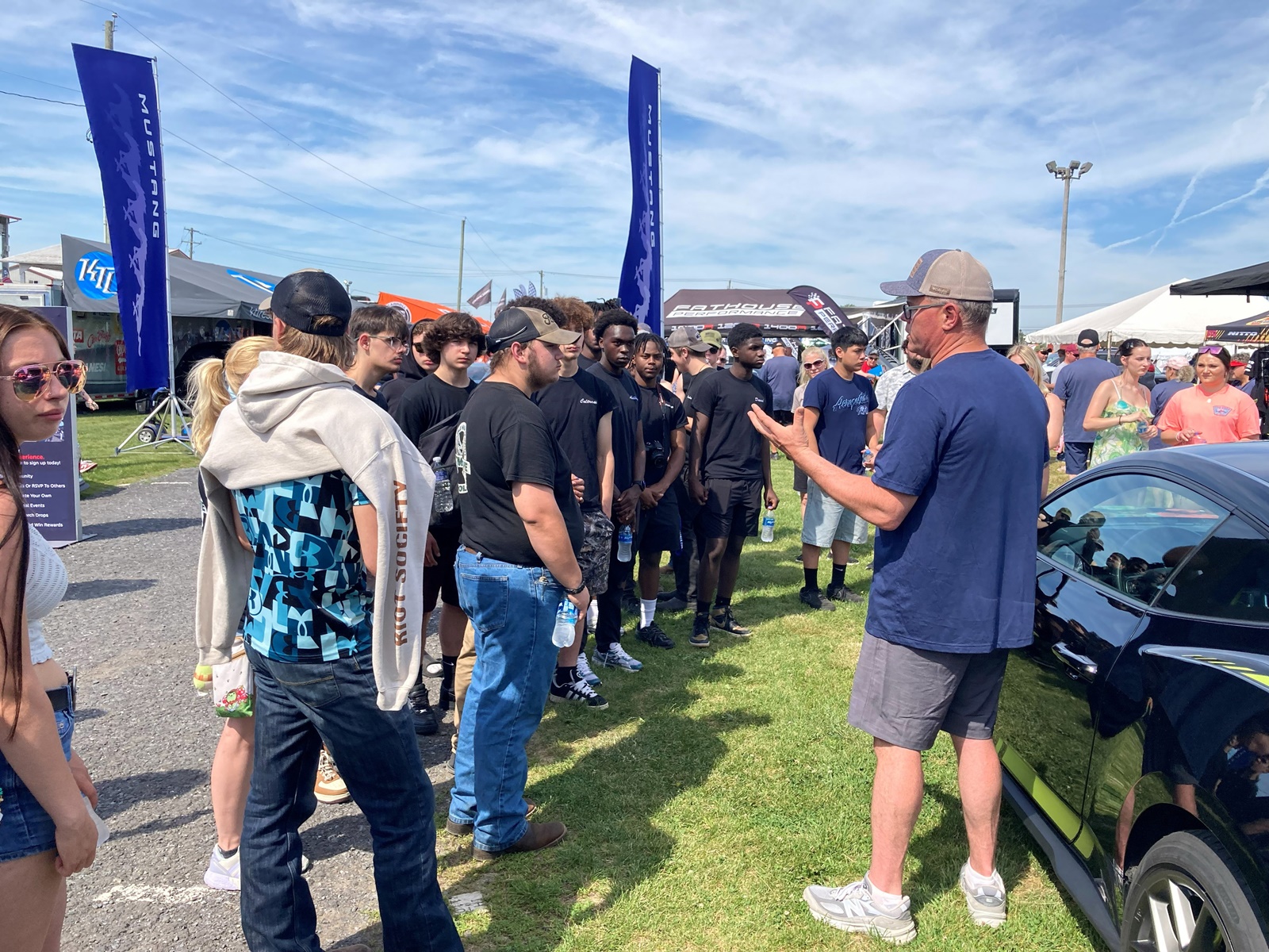 Rich Whitworth of the Ford ASSET Team speaks with the students about offerings with Ford Motor Company and their dealer network for those looking to pursue automotive based careers